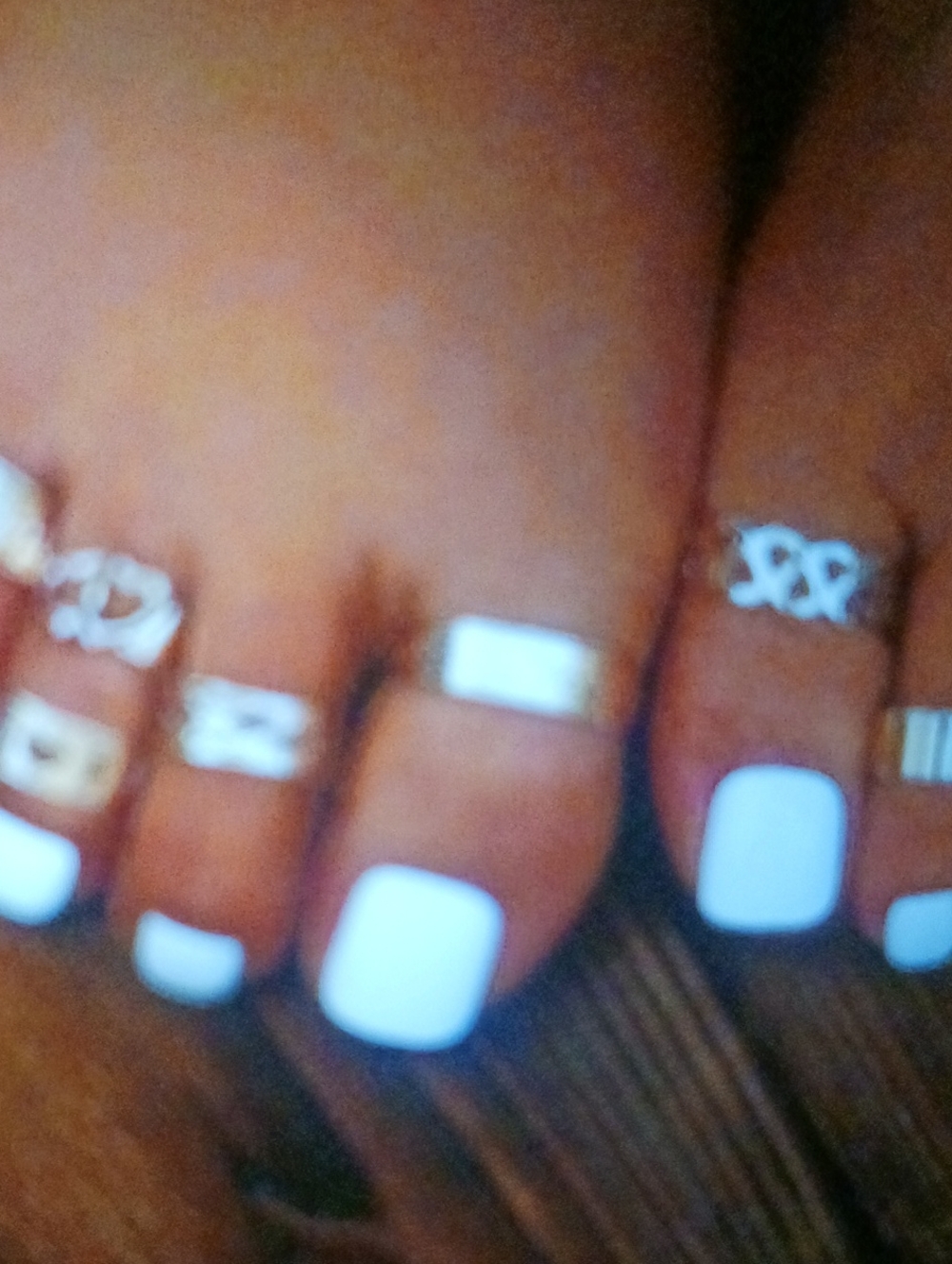 White Pedicure with Silver Toe Rings 8